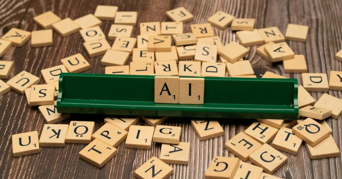 Wooden letter tiles spelling AI, representing technology and innovation.