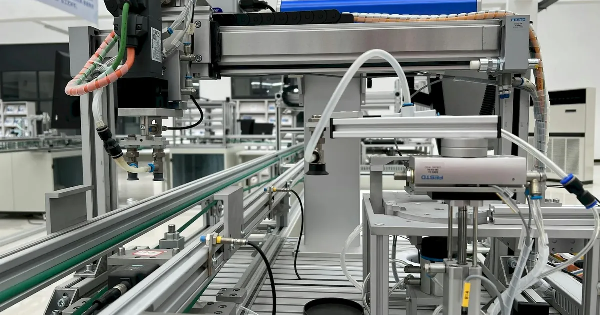 Close-up view of modern automation machinery in an industrial setting.